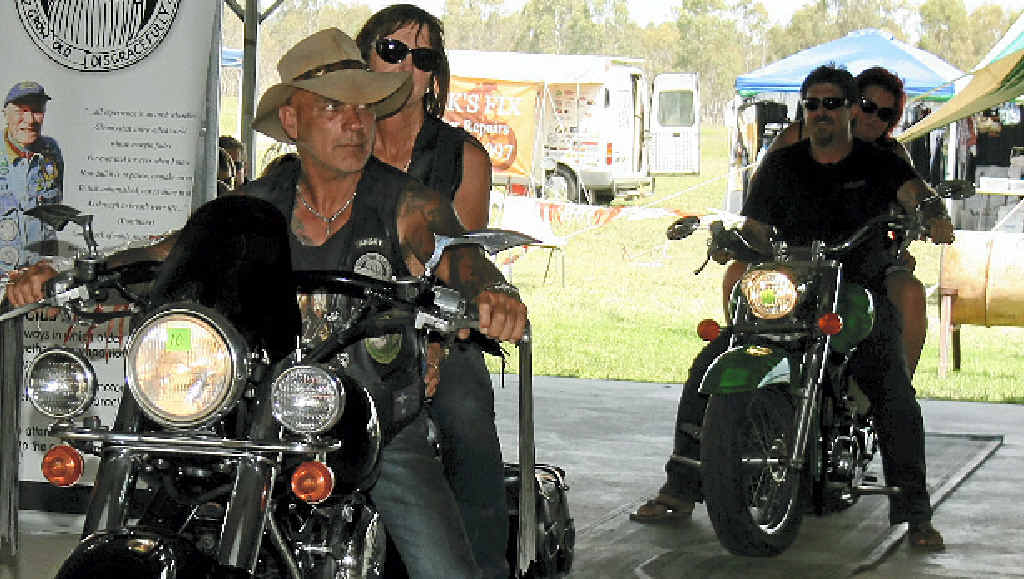 President of the Ulysees Club Warwick branch Wayne “Angry” Forrugia rides through the bar. President of the Ulysees Club Warwick branch Wayne “Angry” Forrugia rides through the bar.